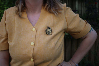Broche scarabée "Goldy"